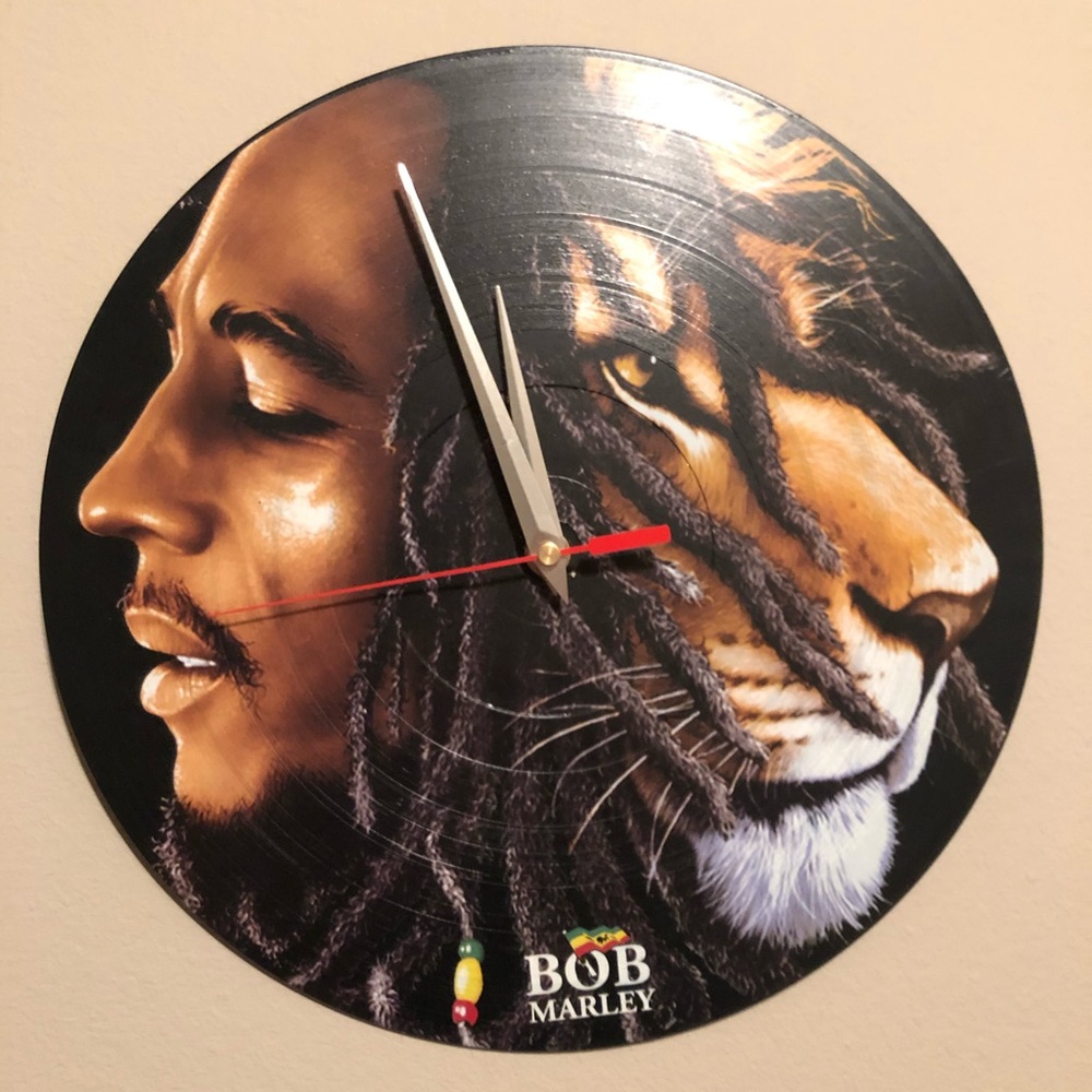 bob marley on a record made into a clock